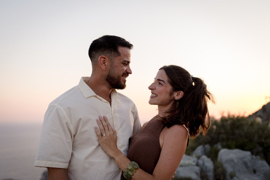 Couple smiling at sunset at Gradac Park viewpoint overlooking Dubrovnik's coastline
